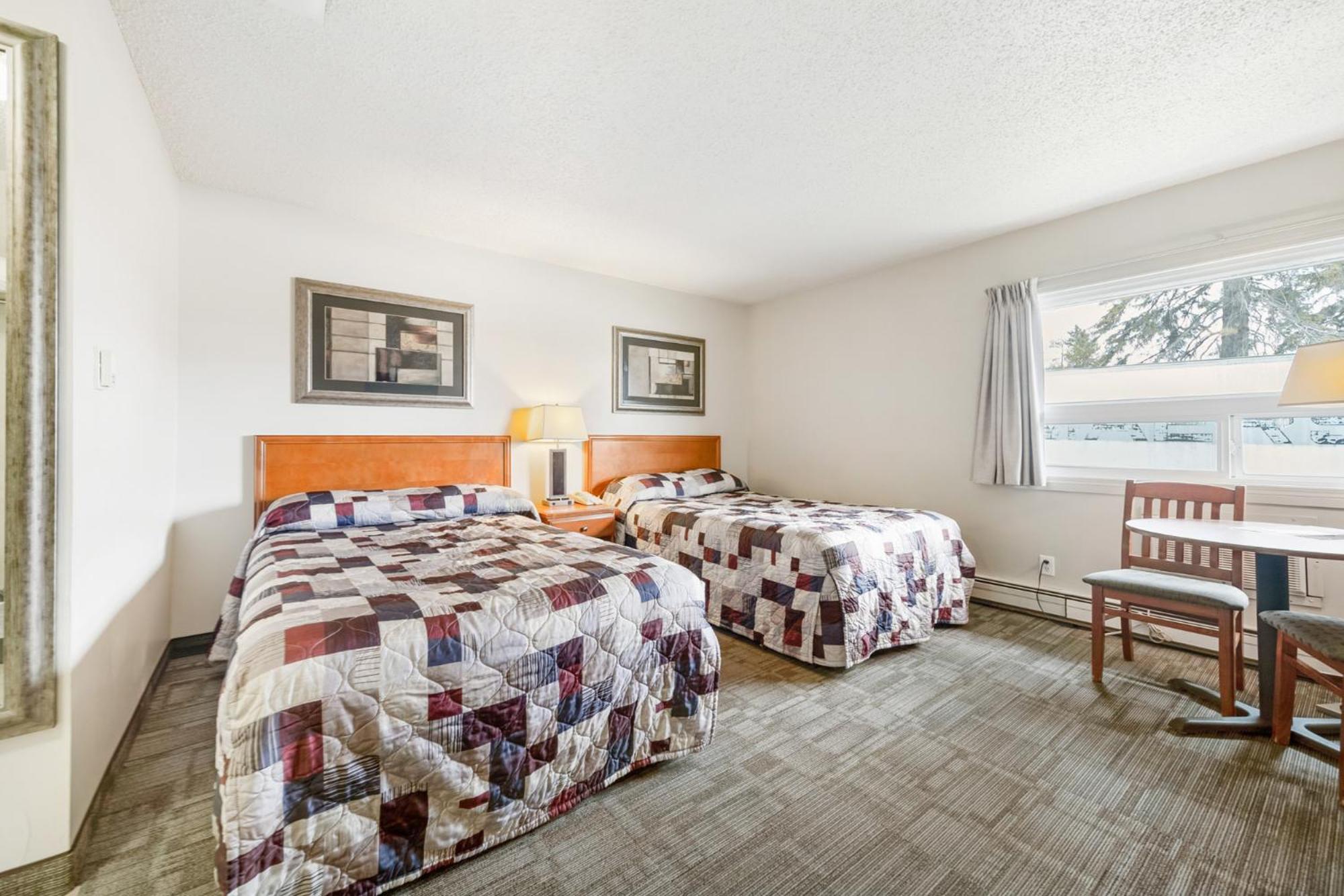 Guest House Inn & Suites Edson Exterior photo